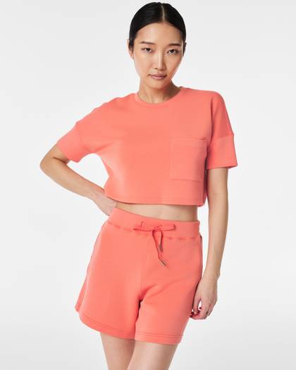 AirEssentials Cropped Pocket Tee - Sunset Peach