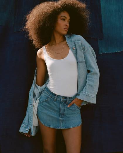 Mid Rise Curved Hem Denim Skirt